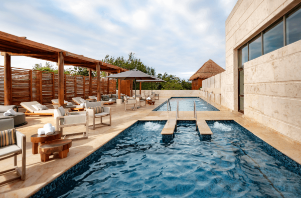 rooftop pool at spa with lounge chairs